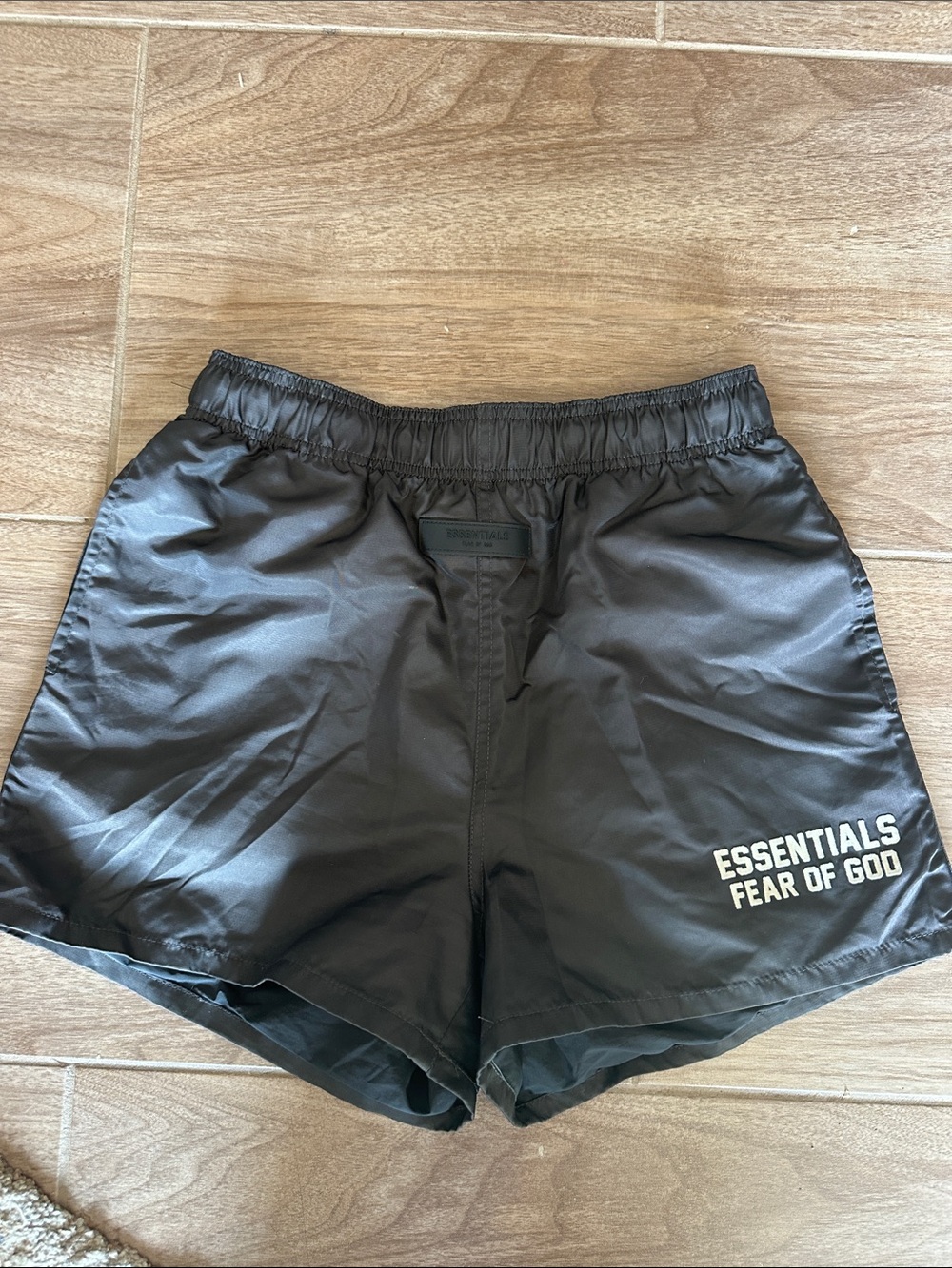 Fear of God ESSENTIALS Black Shorts with White Logo
